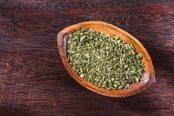 dried moringa leaves in bowl on the table, Moringa oleifera