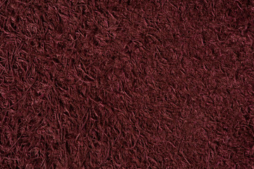 Brown suede texture close up. Back of brown leather background.
