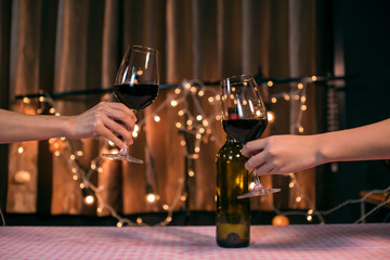 Waitress man pouring wine into glass
