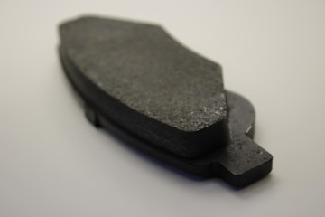 brake pad, new black on white background