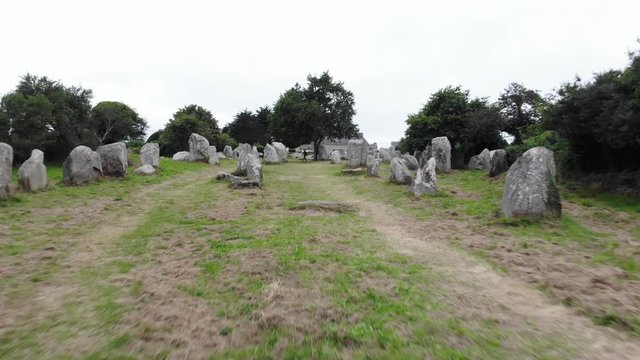 Aerial touristic view of Erdeven standing menhirs: 10 rows of 165 standing menhirs, cut by the road connecting Erdeven to Plouharnel.