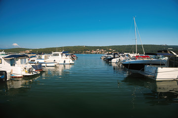 Fototapeta na wymiar Boats on the dock, Cizici town , Krk Island , Croatia
