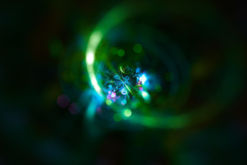 Abstract colorful light elements on dark background. 