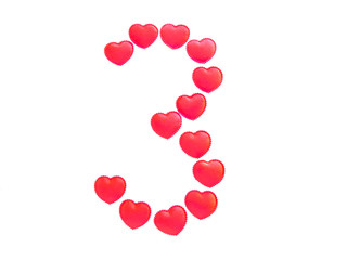 The number three is made up of small red hearts isolated on a white background. Bright red font.