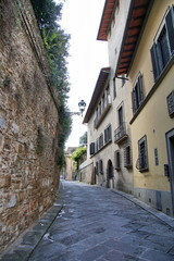 Fototapeta na wymiar View of small street in the historical town of Florence