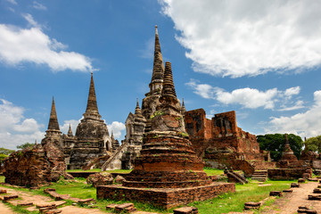Fototapeta premium Remains of ancient temples in the historical site Ayutthaya in Thailand