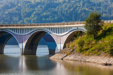Fototapeta na wymiar Bicaz lake and Poiana Teiului viaduct in Romania