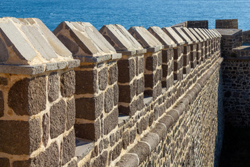 Castle defense wall and sea background
