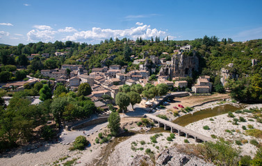 The small medieval village Labeaume framed by rocks and the river Ardeche in southern France
