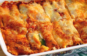 Dish of zucchini lasagna smothered with cheese