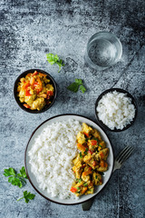 Curry chicken with rice in a plate