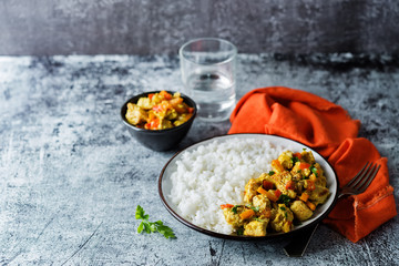 Curry chicken with rice in a plate