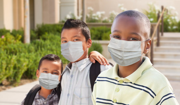 Young Students On School Campus Wearing Medical Face Mask During Coronavirus Pandemic