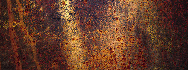 Panoramic grunge rusted old metal texture. Rusty corrosion and oxidized plate. Worn metallic iron...