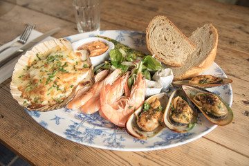 Fresh seafood platter prawns mussels chowder sharing meal