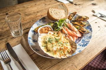Fresh seafood platter prawns mussels chowder sharing meal
