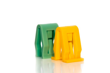 Two automotive plastic clips on white background
