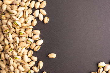 Isolated pistachio on back background.