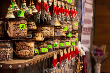 Traditional hand made goods for sale in an open air store in the Carpathian mountains with prices and words in Ukrainian - 