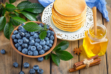 Blueberries with pancakes. Dessert breakfast. 