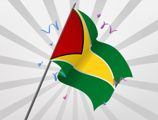 The celebratory flag of Guyana flies at height