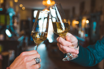 Prosecco champagne cheers two glasses friends toasting celebrate 