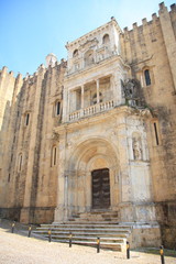 Principal facade of Se Velha, Santa Maria de Coimbra, the old Cathedral of Coimbra, Portugal.