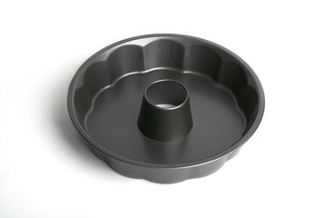 metal mold for baking and food on a white background