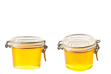 jar of honey isolated on white background. full jar of honey.