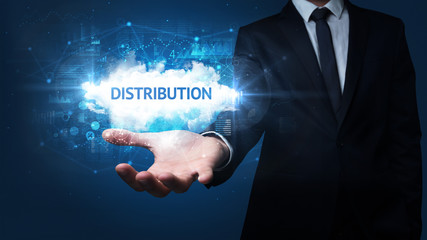 Hand of Businessman holding DISTRIBUTION inscription, successful business concept