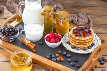 Healthy breakfast on an old background. The concept of tasty and healthy food.