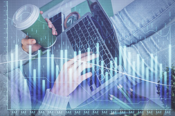 Double exposure of woman hands typing on computer and forex chart hologram drawing. Stock market invest concept.