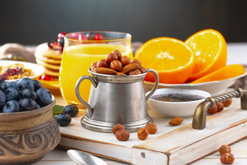 Healthy breakfast on an old background. The concept of tasty and healthy food.