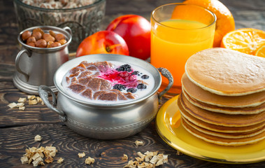 Breakfast natural healthy food, dessert, drinks, fruits, on an old background with kitchen...