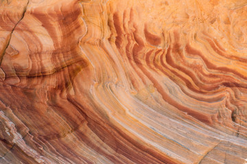 Naklejka premium A strange curving abstract stone texture in coyote buttes Arizona.