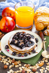 Breakfast natural healthy food, dessert, drinks, fruits, on an old background with kitchen accessories.