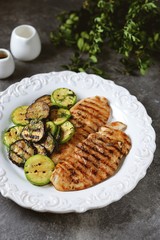 Grilled chicken breast, courgettes and eggplants marinated with olive oil, garlic and soy sauce. Healthly food.