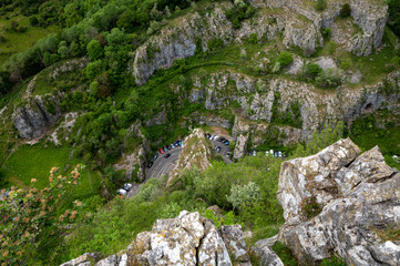 Cliffs of Cheddar Gorge from high viewpoint. High limestone cliffs in canyon in Mendip Hills in Somerset, England, UK