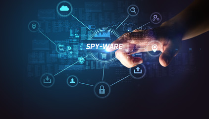 Hand touching SPY-WARE inscription, Cybersecurity concept