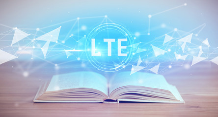 Open book with LTE abbreviation, modern technology concept