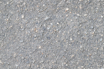 The seamless texture of the asphalt close-up