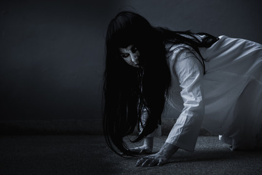 Horror woman ghost creepy crawling, halloween day concept