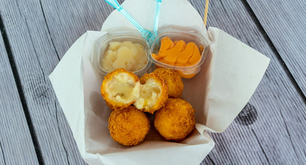 French Fries with Cheese and Chicken Nuggets