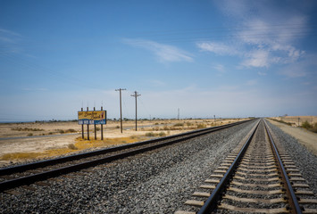 Fototapeta na wymiar railroad tracks in the desert