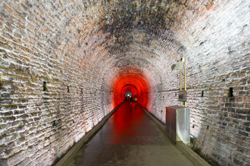 An underground tunnel lit up