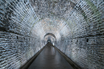 An underground tunnel lit up