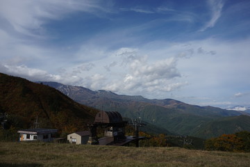 Fototapeta na wymiar An amazing autumn season landscape of Japanese mountains, Nagano, Japan, national nature park