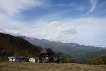 Fototapeta na wymiar An amazing autumn season landscape of Japanese mountains, Nagano, Japan, national nature park
