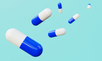 Blue and white capsules on cyan green background.