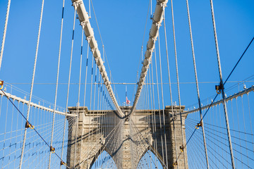 Detail of Brooklyn Bridge column with blue sky